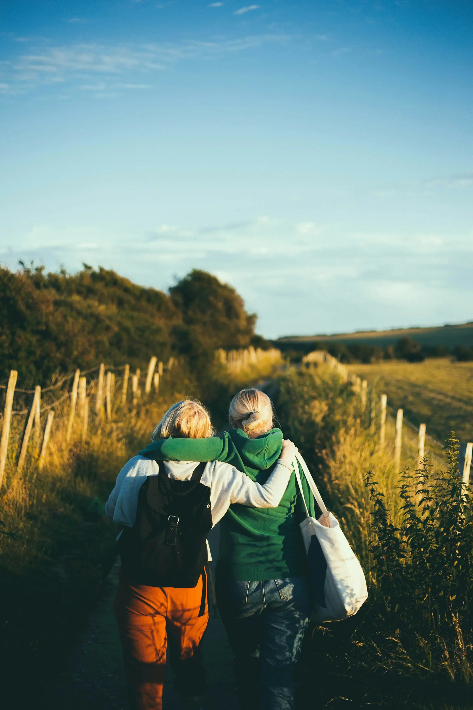 Two women walking together outdoors